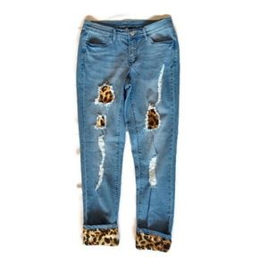 Jeans with tiger patches